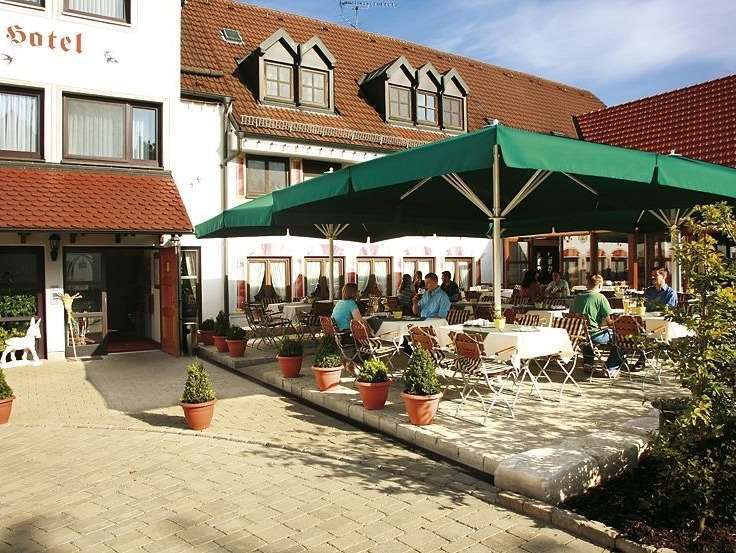 Hotel Hirsch Ной-Улм Ресторант снимка